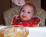 Baby enjoying Sweet Potato Baby Food Baby enjoying Sweet Potato Baby Food